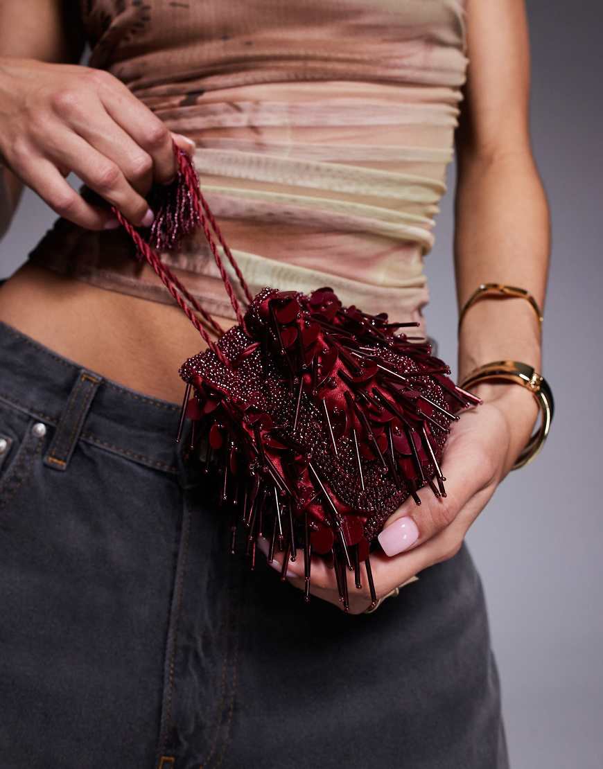 ASOS DESIGN - Mini-Clutch in Burgunderrot mit Perlenverzierung und Paillettenbesatz von ASOS DESIGN