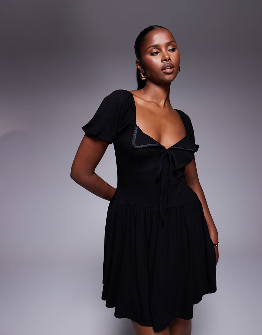 ASOS DESIGN - Mini-Freizeitkleid in Schwarz mit Puffärmeln von ASOS DESIGN