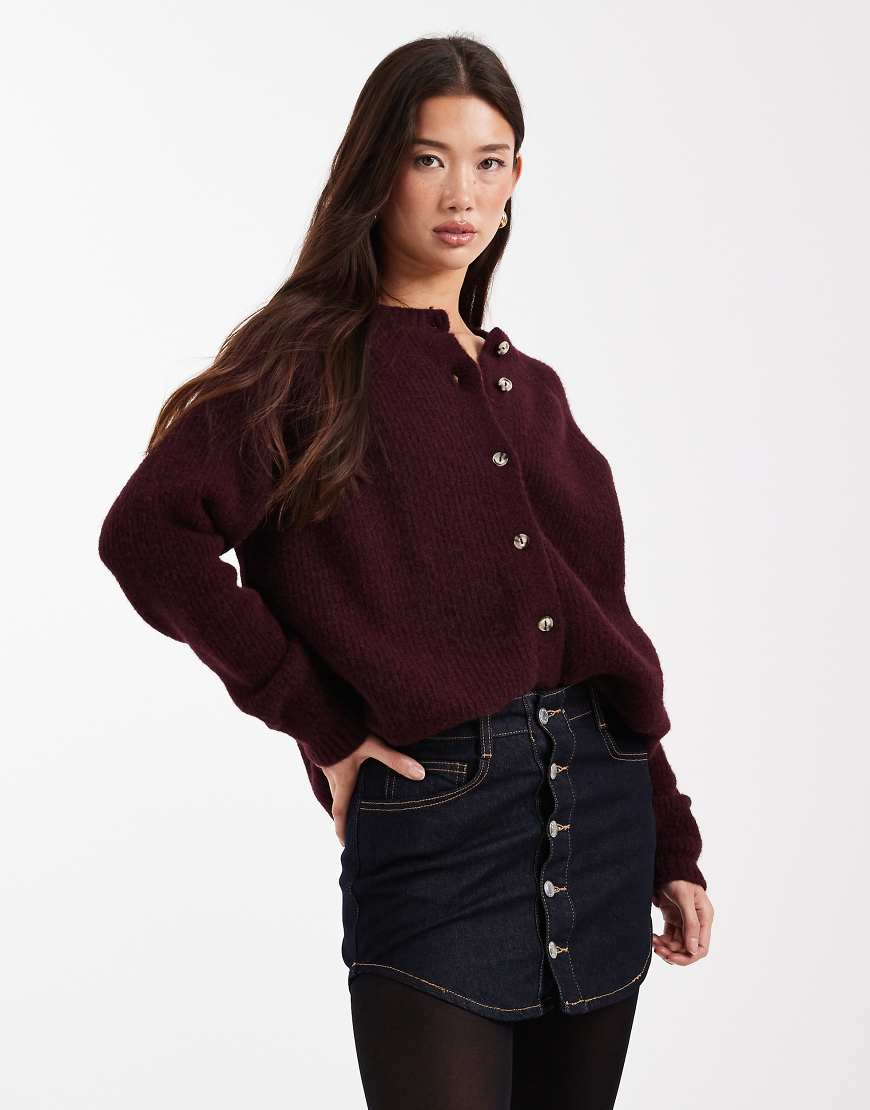 ASOS DESIGN - Mini-Jeansrock mit abgerundetem Saum, Knopfleiste und Waschung-Blau von ASOS DESIGN