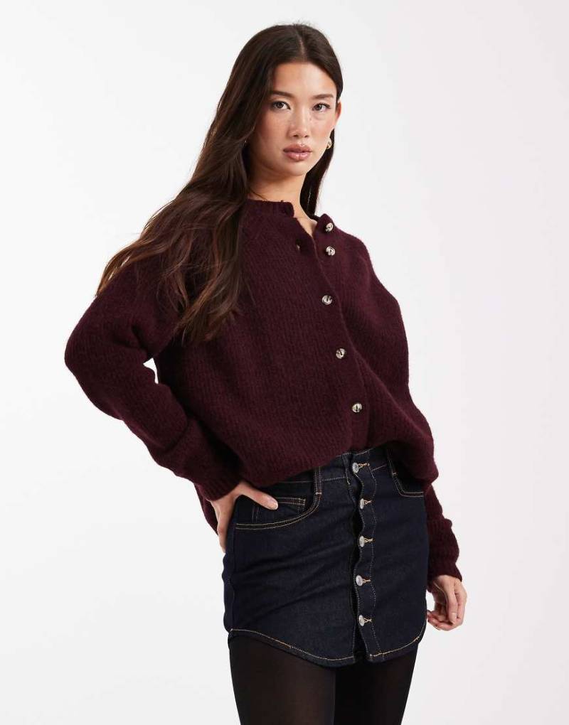 ASOS DESIGN - Mini-Jeansrock mit abgerundetem Saum, Knopfleiste und Waschung-Blau von ASOS DESIGN