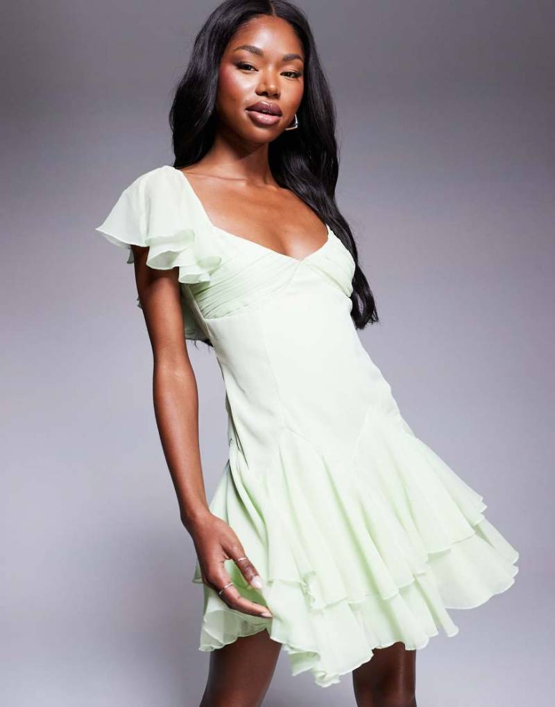 ASOS DESIGN - Minikleid in Salbeigrün mit weitem Rock mit tief angesetzter Taille von ASOS DESIGN