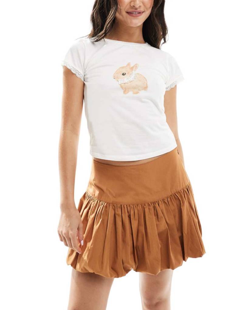 ASOS DESIGN - Minirock in Senfgelb mit Ballonsaum und tiefer Taille von ASOS DESIGN