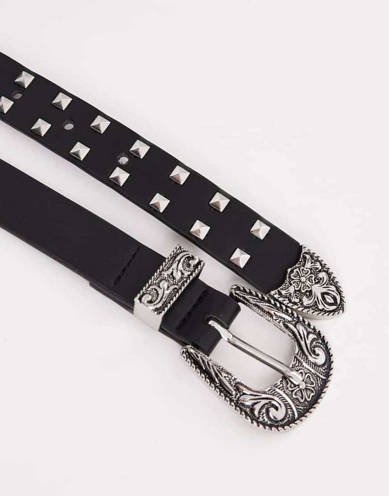 ASOS DESIGN - Mit Nieten besetzter, schmaler Western-Gürtel aus Kunstleder in Schwarz von ASOS DESIGN