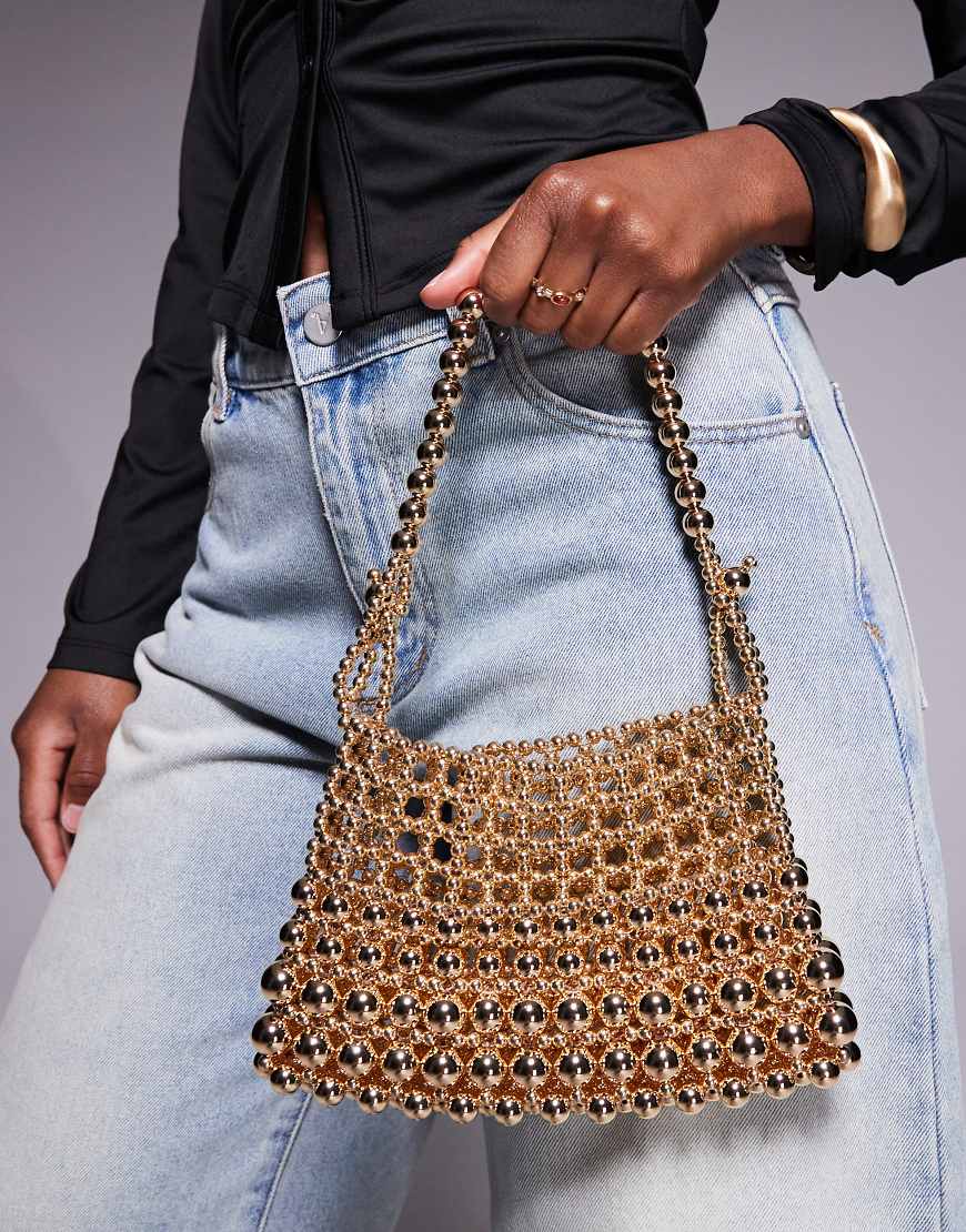 ASOS DESIGN - Mit Perlenkugeln besetzte Clutch in Gold mit verstellbarem Griff-Goldfarben von ASOS DESIGN