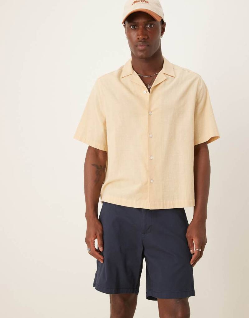 ASOS DESIGN - Mittellange Pull-on-Chinoshorts in Marineblau ASOS DESIGN - Mittellange Pull-on-Chinoshorts in Marineblau von ASOS DESIGN