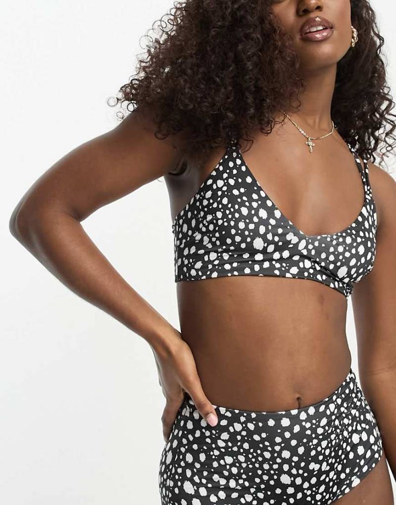 ASOS DESIGN - Mix and Match - Kurz geschnittenes Bikinioberteil mit Riemchendetail und Tupfenmuster in Schwarz-Weiß-Bunt von ASOS DESIGN