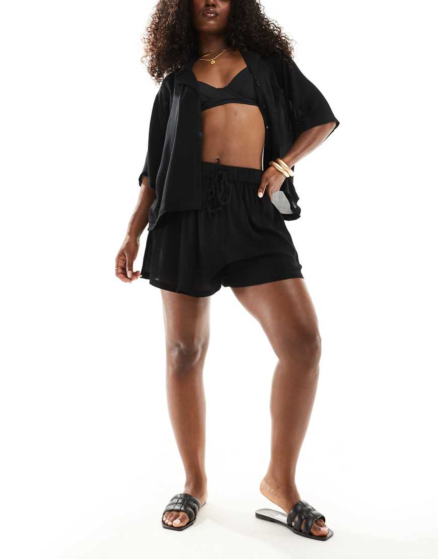 ASOS DESIGN - Mix & Match - Strand-Shorts in Schwarz mit Knitterstruktur ASOS DESIGN - Mix & Match - Strand-Shorts in Schwarz mit Knitterstruktur von ASOS DESIGN
