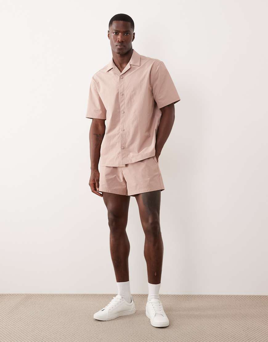ASOS DESIGN - MotionMAX - Kürzer geschnittene Shorts in Rosa von ASOS DESIGN