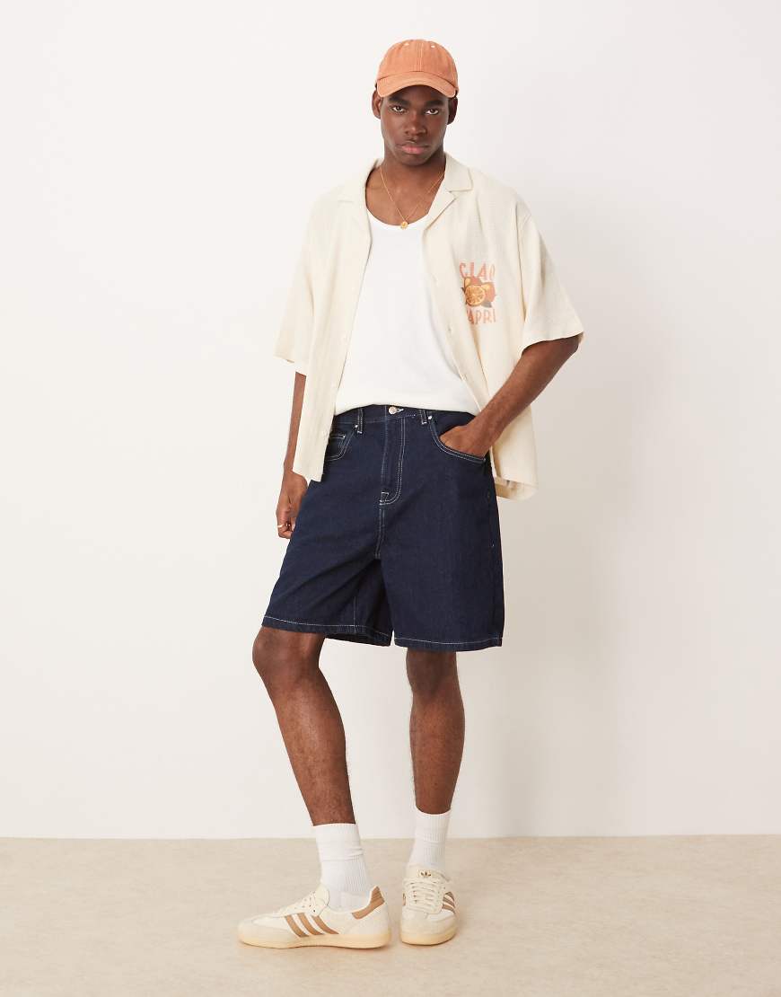 ASOS DESIGN - Normal geschnittene Jeans-Jorts in Indigoblau ASOS DESIGN - Normal geschnittene Jeans-Jorts in Indigoblau von ASOS DESIGN