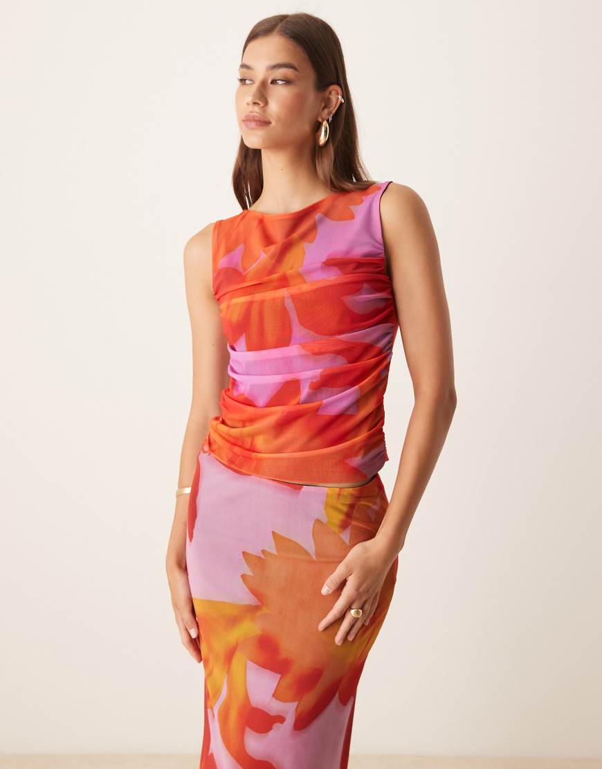 ASOS DESIGN - Oberteil aus Netzstoff in Orange mit großflächigem tropischem Blumenmuster und U-Boot-Ausschnitt, Kombiteil ASOS DESIGN - Oberteil aus Netzstoff in Orange mit großflächigem tropischem Blumenmuster und U-Boot-Ausschnitt, Kombiteil von ASOS DESIGN