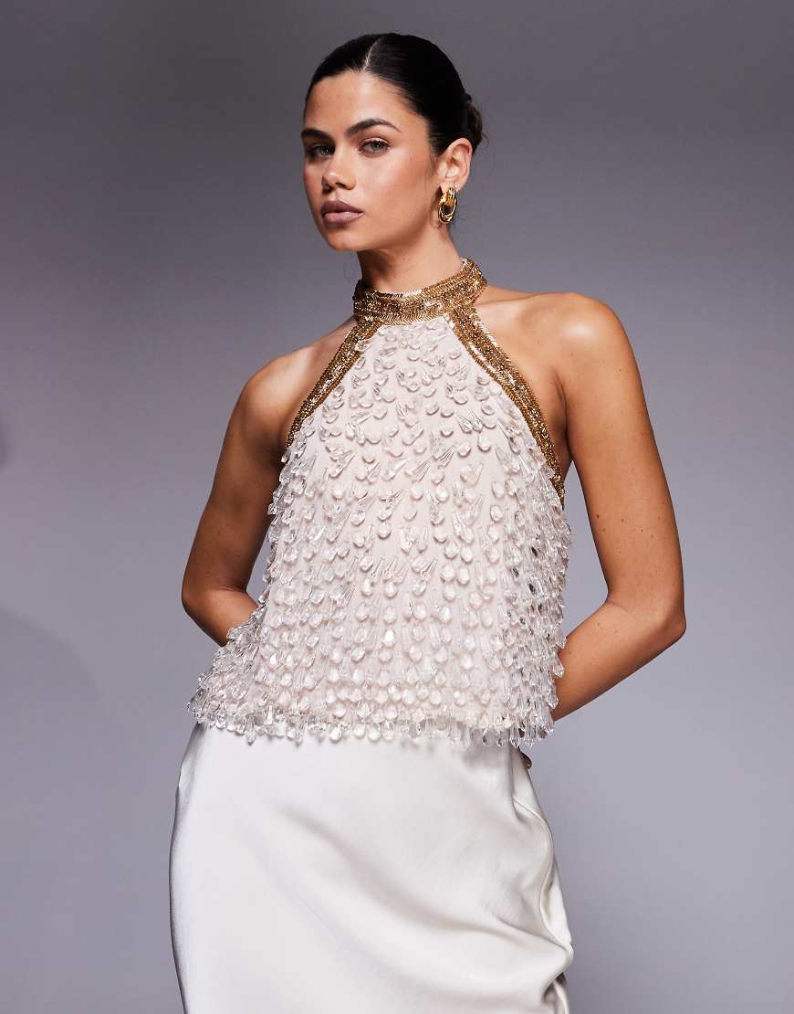 ASOS DESIGN - Oberteil in Rosa mit tropfenförmigem Strukturmuster und verziertem Neckholder-Träger von ASOS DESIGN