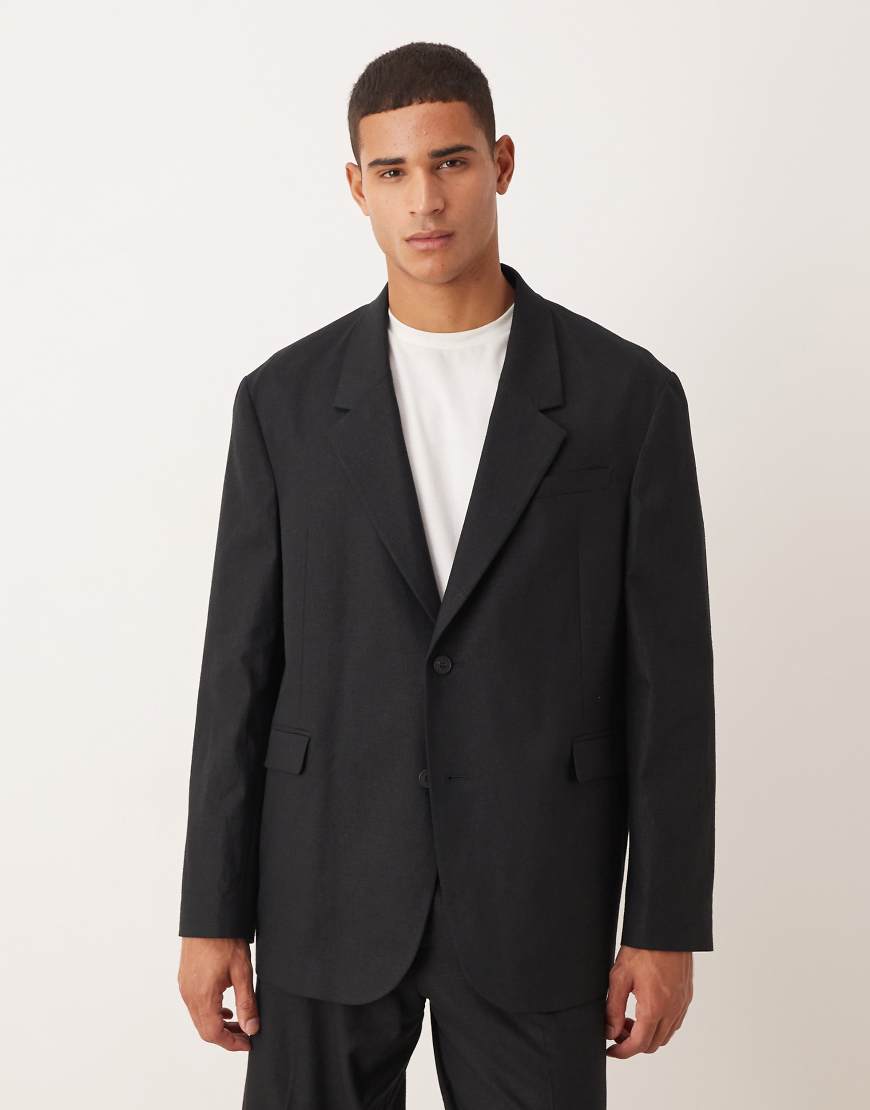 ASOS DESIGN - Oversize-Anzugjacke in Schwarz meliert ASOS DESIGN - Oversize-Anzugjacke in Schwarz meliert von ASOS DESIGN