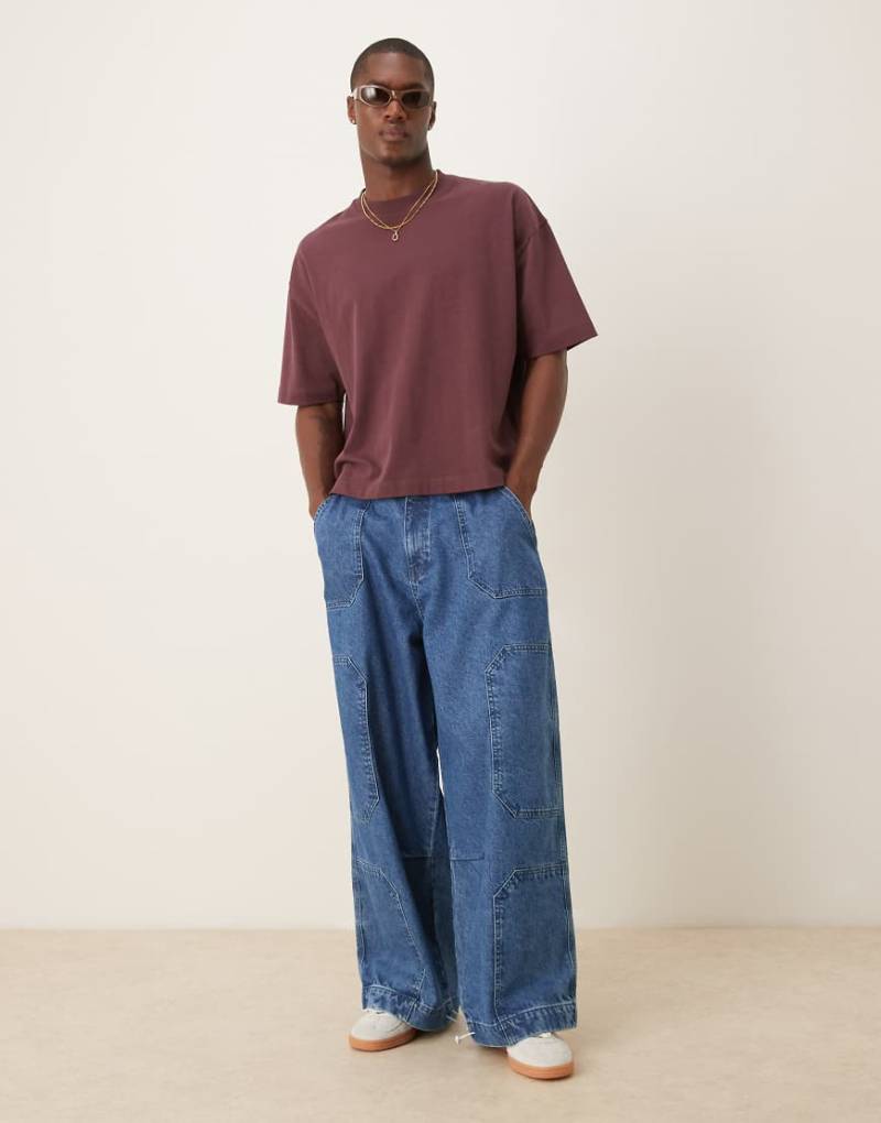 ASOS DESIGN - Oversize-Fallschirmjeans in mittelblauer Waschung von ASOS DESIGN