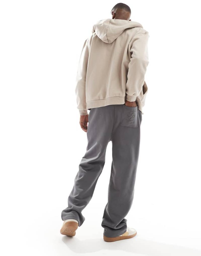 ASOS DESIGN - Premium - Jogginghose in Anthrazit mit erhöhtem Print und weitem Bein-Grau von ASOS DESIGN