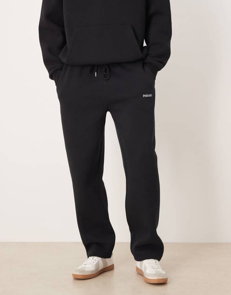 ASOS DESIGN - Oversize-Jogginghose in Schwarz mit Print, Kombiteil von ASOS DESIGN