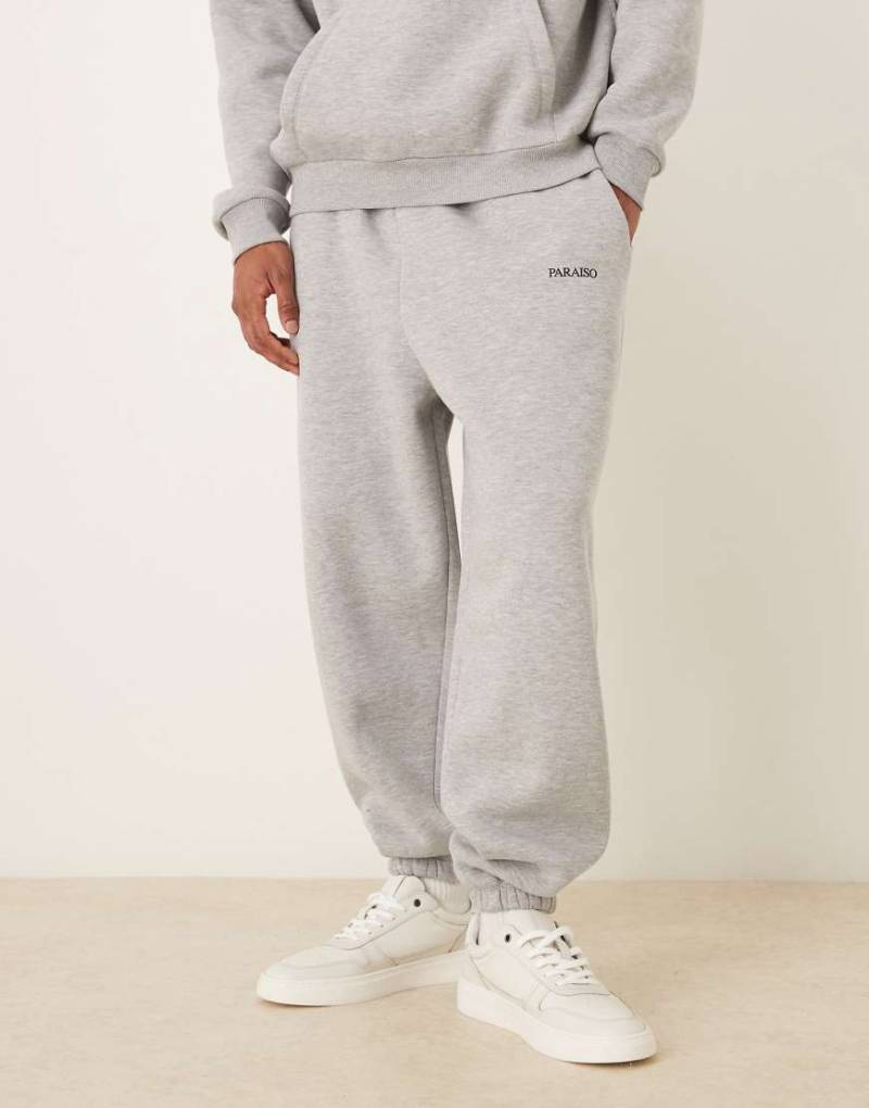 ASOS DESIGN - Oversize-Jogginghose in meliertem Grau mit Print, Kombiteil von ASOS DESIGN