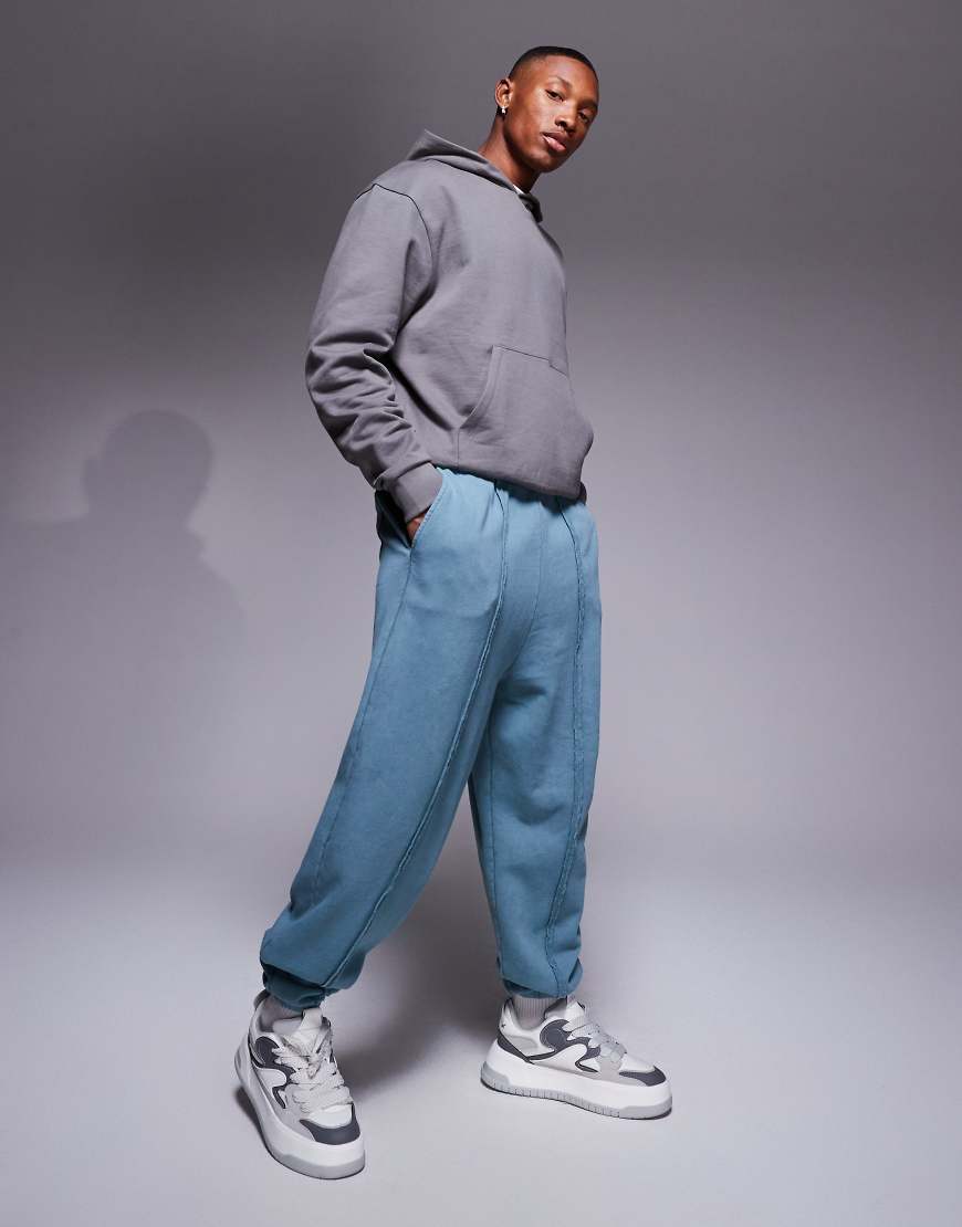ASOS DESIGN - Oversize-Jogginghose in verwaschenem Blau mit Ziernähten von ASOS DESIGN