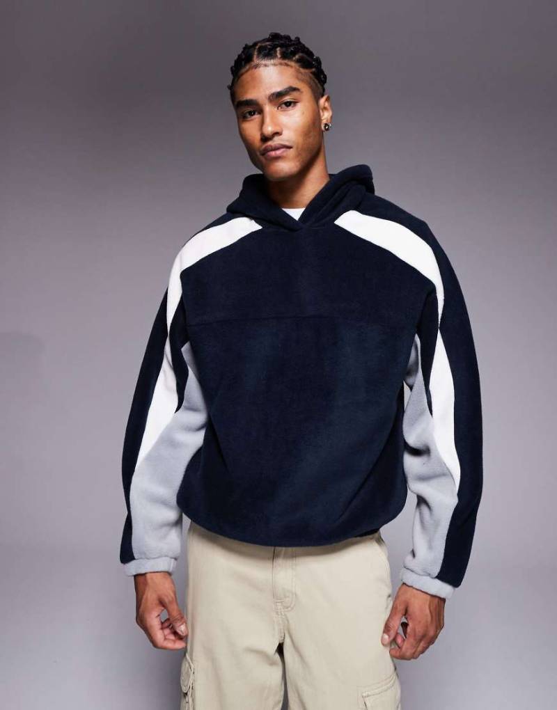 ASOS DESIGN - Oversize-Kapuzenpullover aus Fleece in Marineblau mit Farbblock-Design von ASOS DESIGN