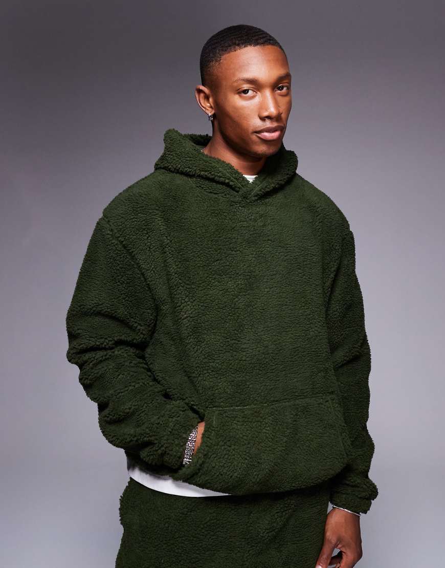 ASOS DESIGN - Oversize-Kapuzenpullover aus Teddyfell in Grün ASOS DESIGN - Oversize-Kapuzenpullover aus Teddyfell in Grün von ASOS DESIGN