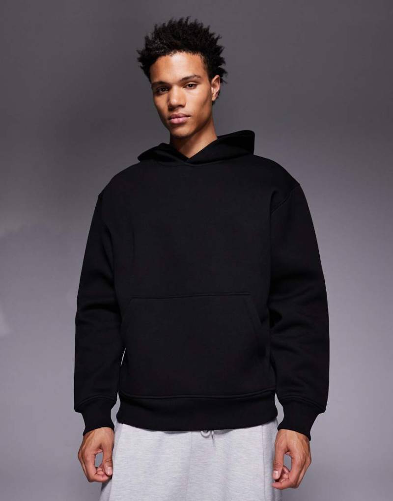 ASOS DESIGN - Oversize-Kapuzenpullover aus schwerem, neoprenartigem Material in Schwarz von ASOS DESIGN