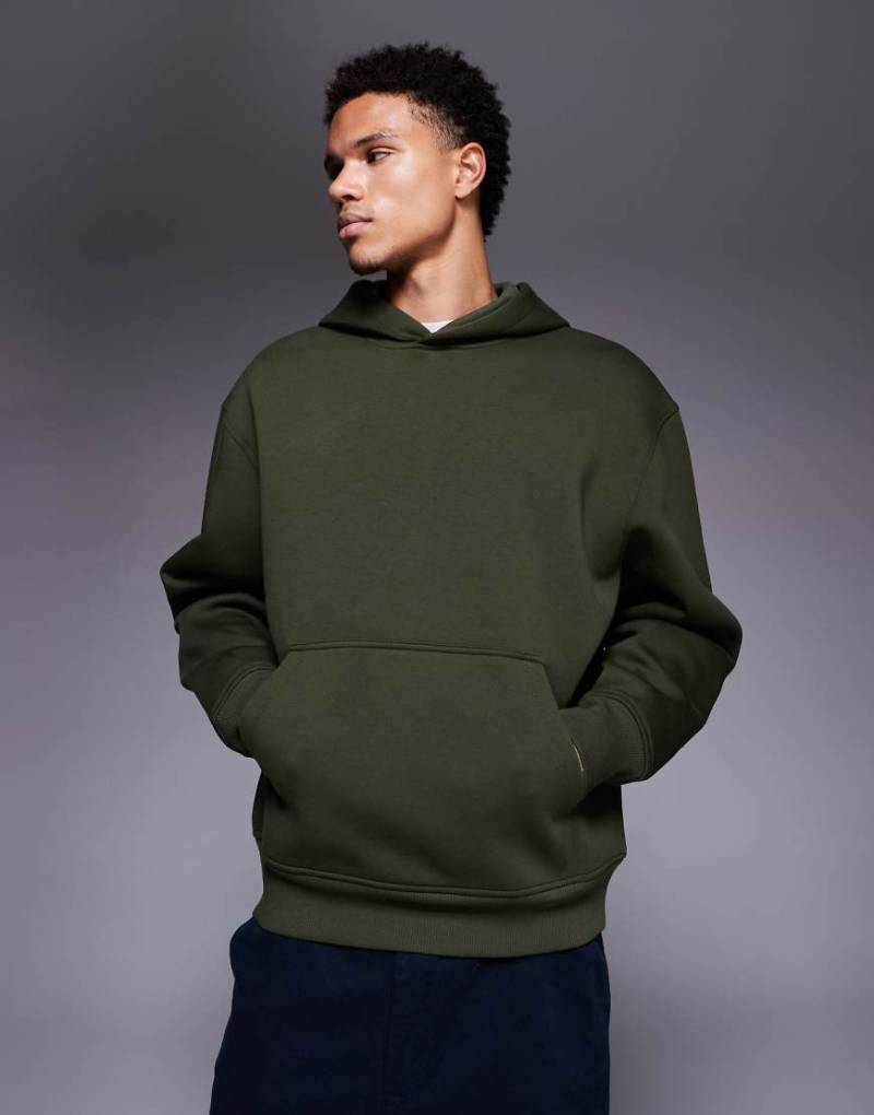 ASOS DESIGN - Oversize-Kapuzenpullover aus schwerem neoprenartigem Stoff in Grün von ASOS DESIGN