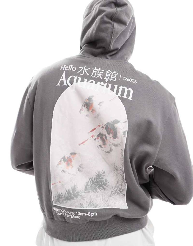 ASOS DESIGN - Oversize-Kapuzenpullover in Anthrazit mit Fotoprint-Grau von ASOS DESIGN