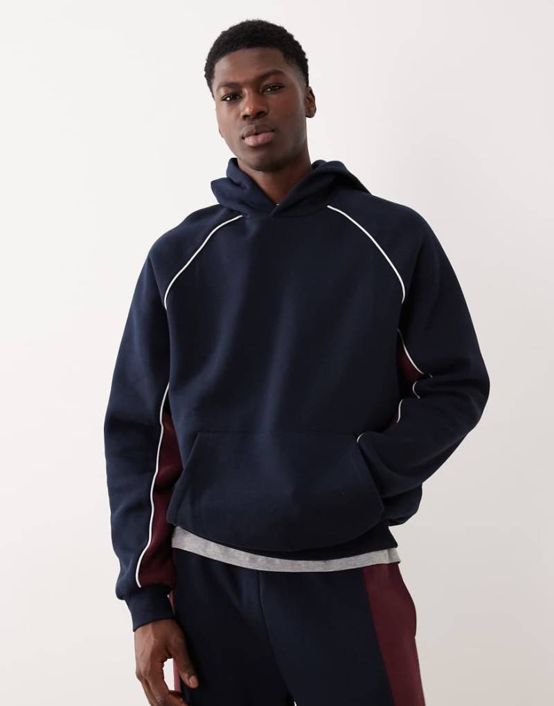 ASOS DESIGN - Oversize-Kapuzenpullover in Marineblau mit abgenähtem Bahnendesign, Kombiteil von ASOS DESIGN