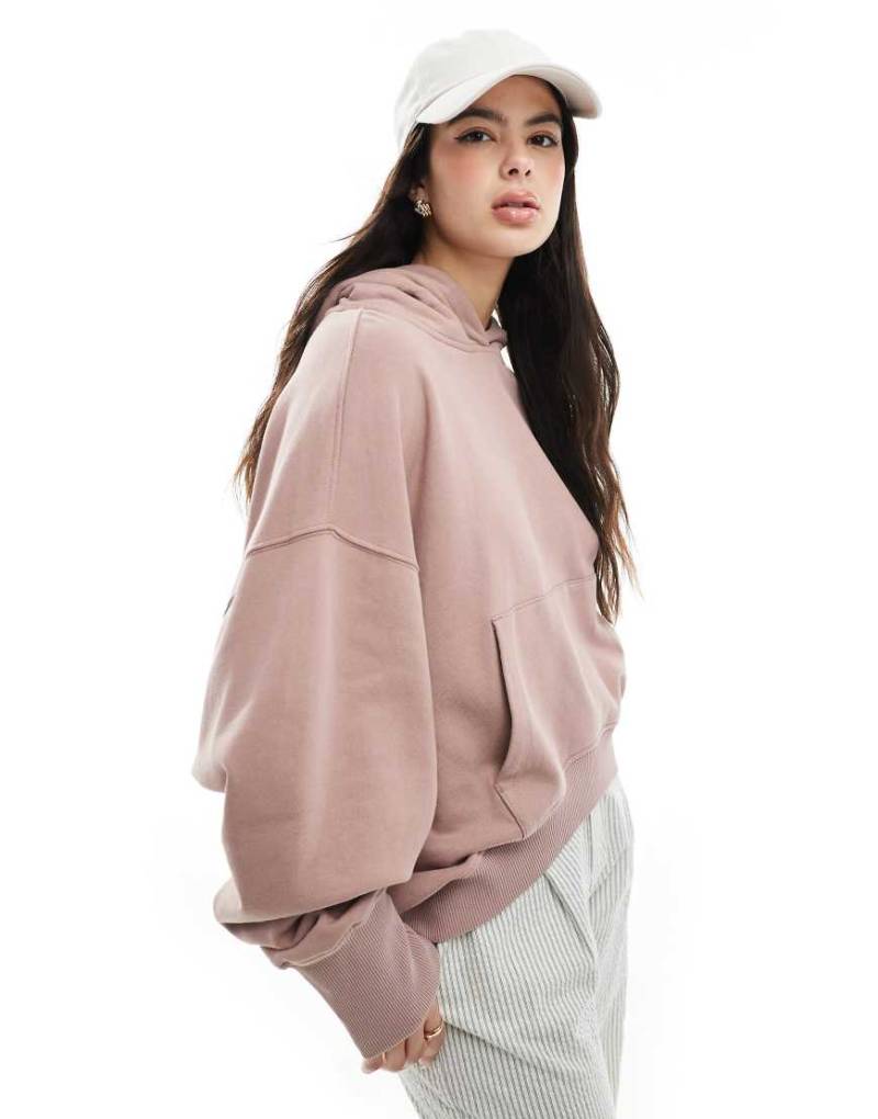 ASOS DESIGN - Oversize-Kapuzenpullover in gewaschenem Altrosa mit asymmetrischem Saum von ASOS DESIGN