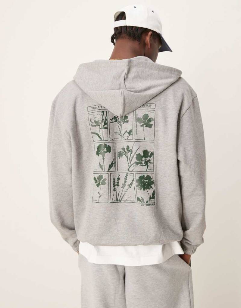 ASOS DESIGN - Oversize-Kapuzenpullover in grau meliert mit Brust- und Rückenprint von ASOS DESIGN