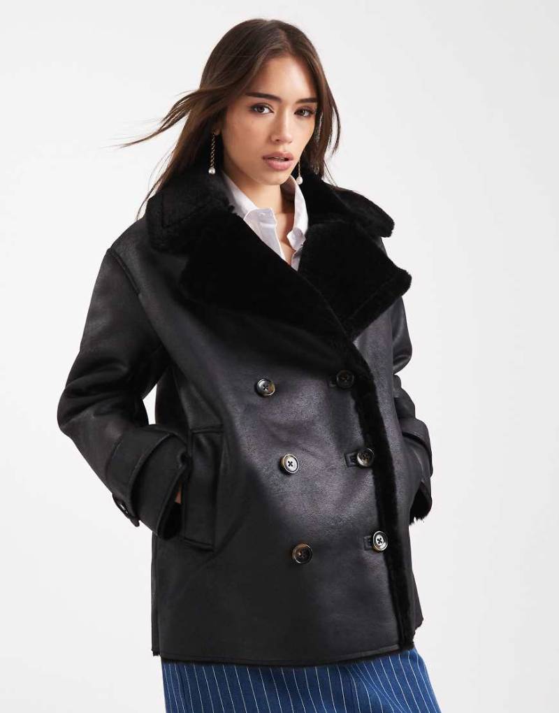 ASOS DESIGN - Verstärkte Oversize-Pilotenjacke in Schwarz mit Teddyfell von ASOS DESIGN