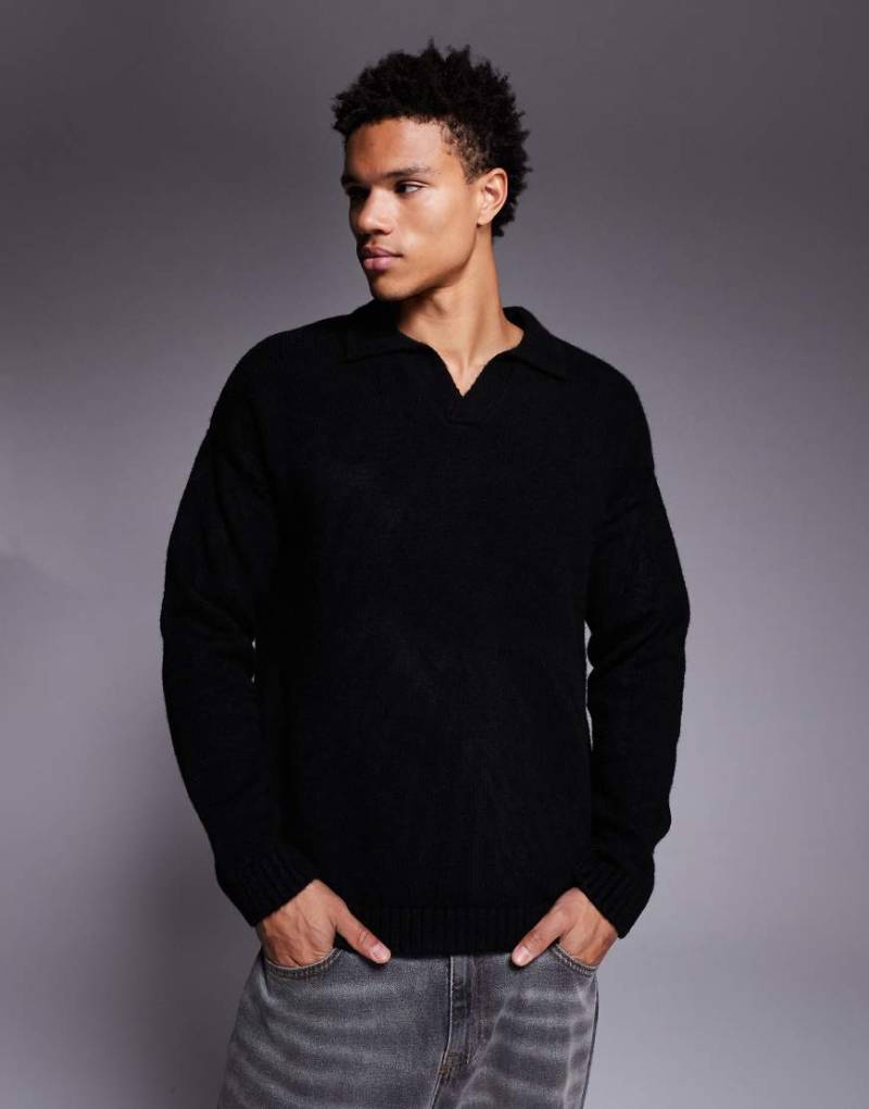 ASOS DESIGN - Oversize-Polohemd aus Strick in Schwarz mit eingekerbtem Ausschnitt von ASOS DESIGN