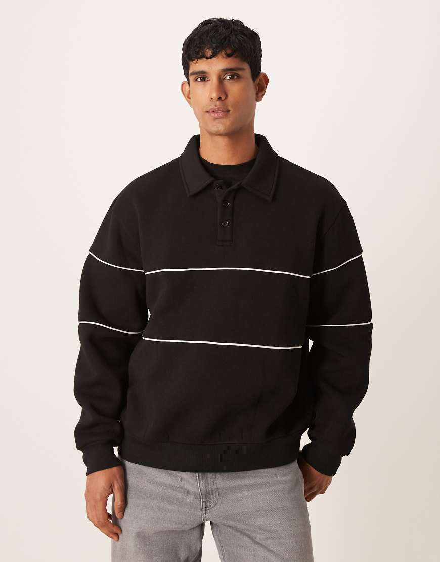 ASOS DESIGN - Relaxed-Fit-Sweatshirt in Schwarz mit Paspelierung und Polokragen von ASOS DESIGN