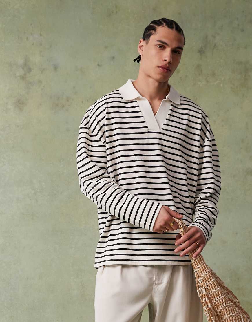 ASOS DESIGN - Oversize-Poloshirt mit schwarz-weißen Strukturstreifen und überschnittenen Schultern-Bunt von ASOS DESIGN