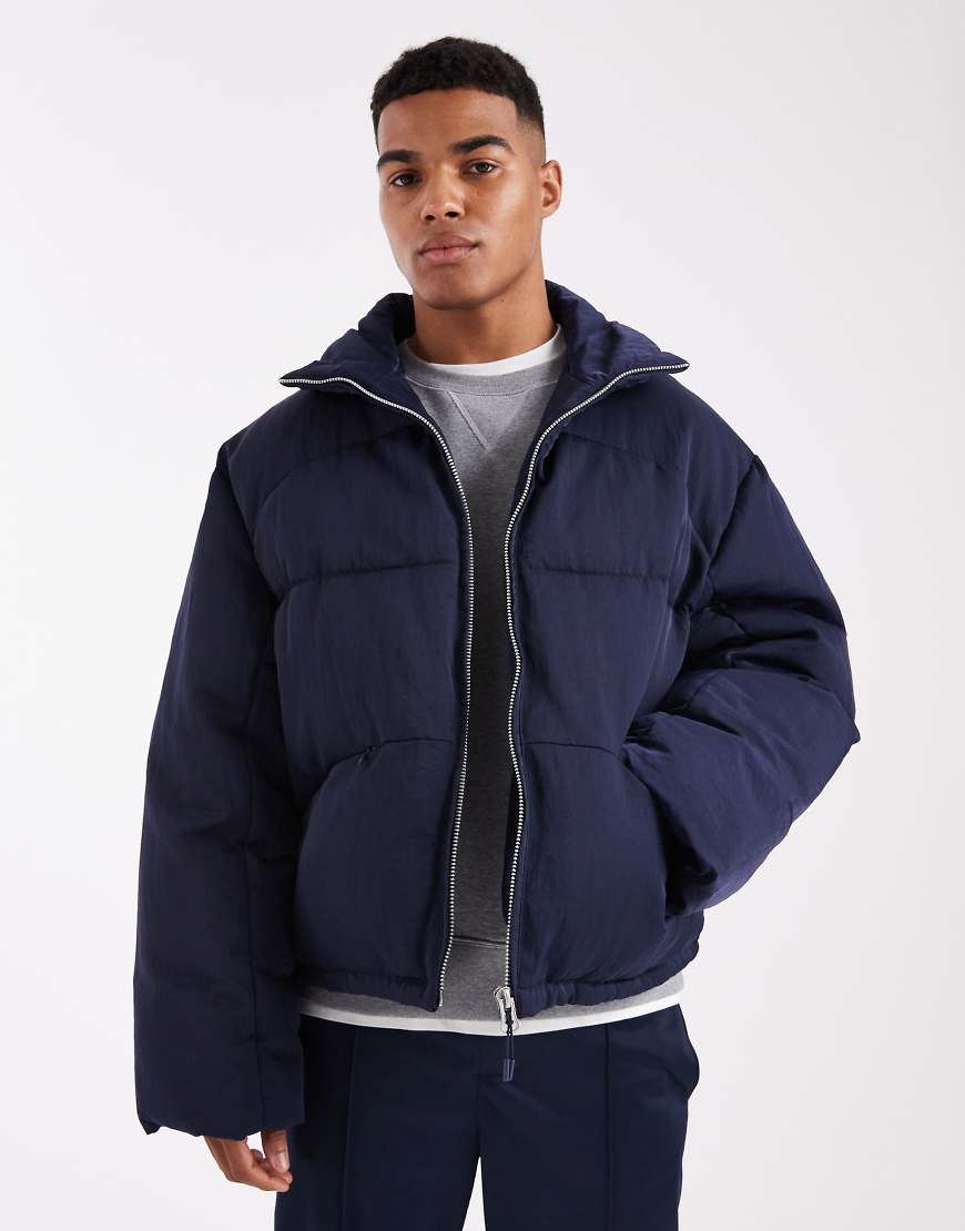 ASOS DESIGN - Oversize-Pufferjacke in Marineblau von ASOS DESIGN