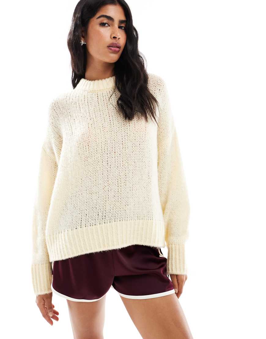 ASOS DESIGN - Oversize-Pullover in Buttermilchgelb mit Rundhalsausschnitt und weitmaschigem Strickmuster ASOS DESIGN - Oversize-Pullover in Buttermilchgelb mit Rundhalsausschnitt und weitmaschigem Strickmuster von ASOS DESIGN