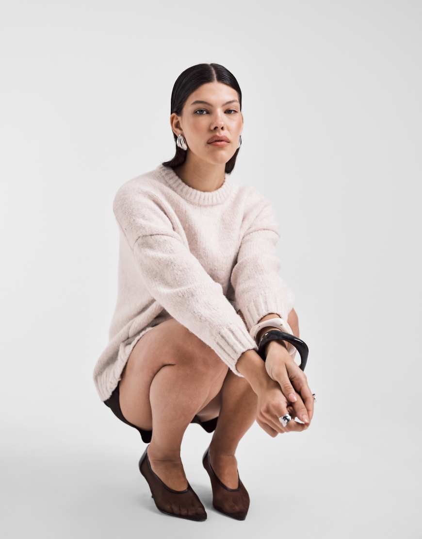 ASOS DESIGN - Oversize-Pullover in Creme mit Rundhalsausschnitt und geschwungenem Saum-Weiß ASOS DESIGN - Oversize-Pullover in Creme mit Rundhalsausschnitt und geschwungenem Saum-Weiß von ASOS DESIGN
