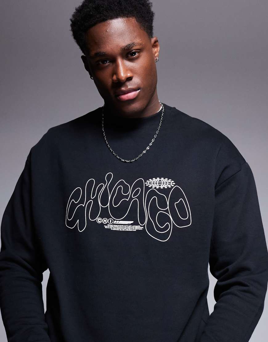 ASOS DESIGN - Sweatshirt in Schwarz mit Rundhalsausschnitt und City-Print ASOS DESIGN - Sweatshirt in Schwarz mit Rundhalsausschnitt und City-Print von ASOS DESIGN