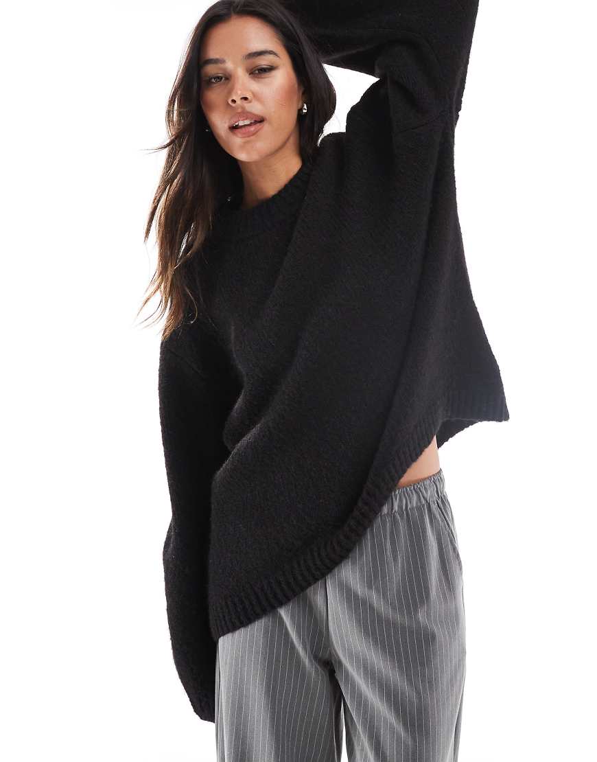 ASOS DESIGN - Oversize-Pullover in Schwarz mit Rundhalsausschnitt ASOS DESIGN - Oversize-Pullover in Schwarz mit Rundhalsausschnitt von ASOS DESIGN