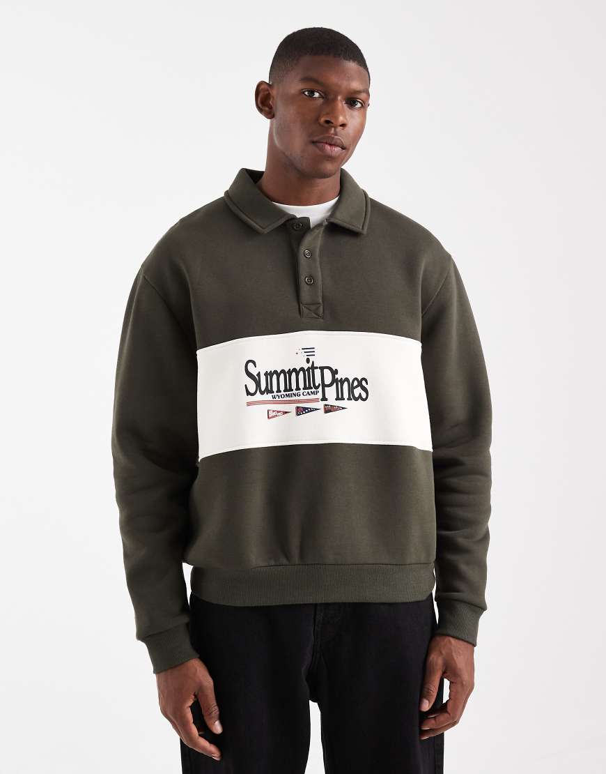 ASOS DESIGN - Oversize-Rugby-Sweatshirt in Grün mit Polokragen, Farbblock-Design und Print von ASOS DESIGN