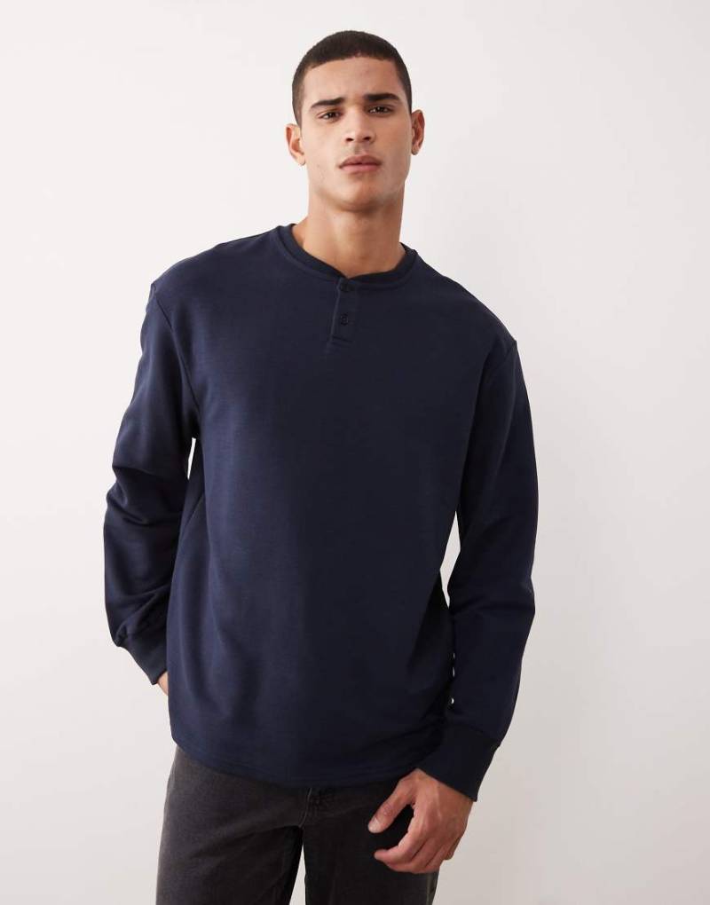 ASOS DESIGN - Oversize-Sweatshirt aus Pikee-Baumwolle in Marineblau mit Henley-Ausschnitt von ASOS DESIGN