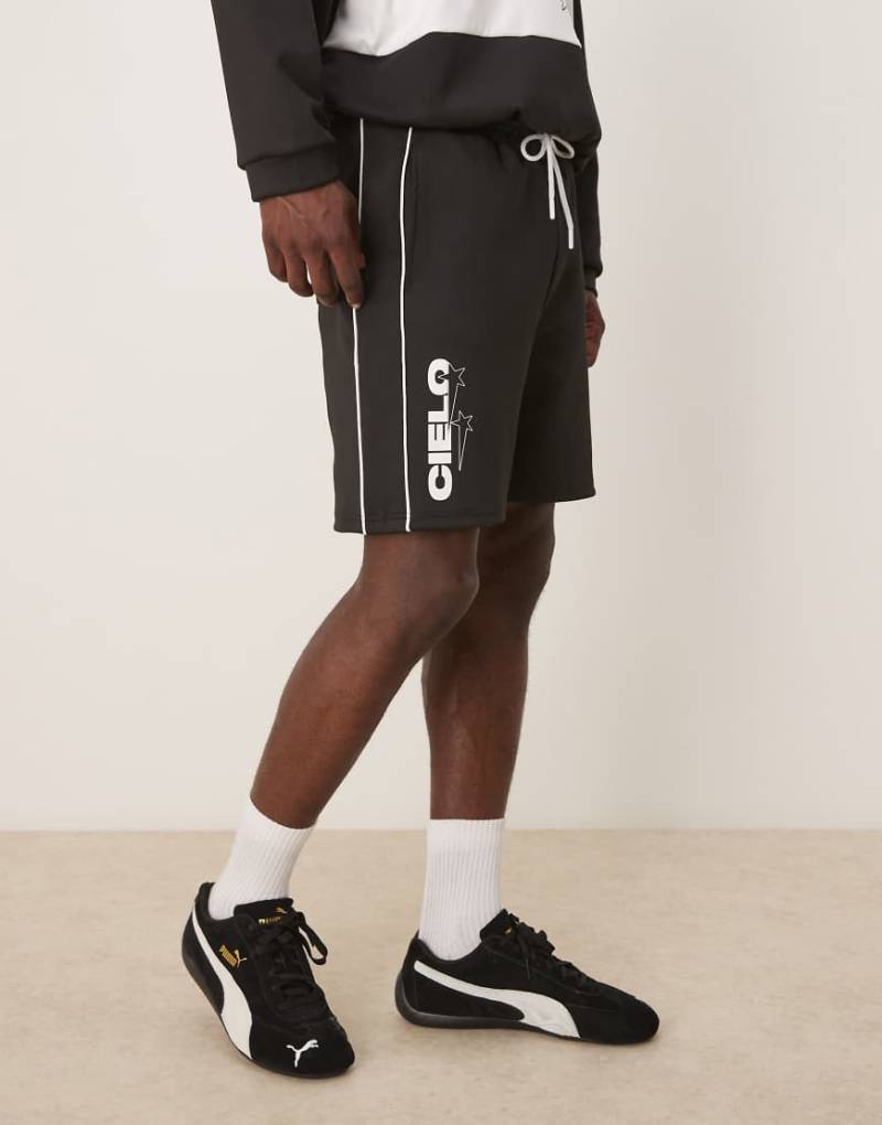 ASOS DESIGN - Oversize-Shorts aus neoprenartigem Material in Schwarz mit Print, Kombiteil von ASOS DESIGN