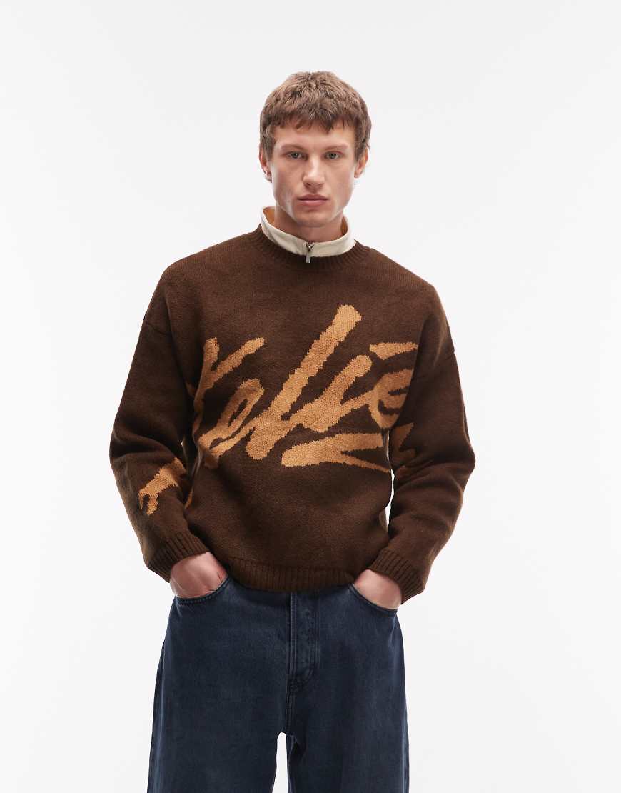 ASOS DESIGN - Oversize-Strickpullover in Braun mit Grafik auf der Brust-Brown von ASOS DESIGN