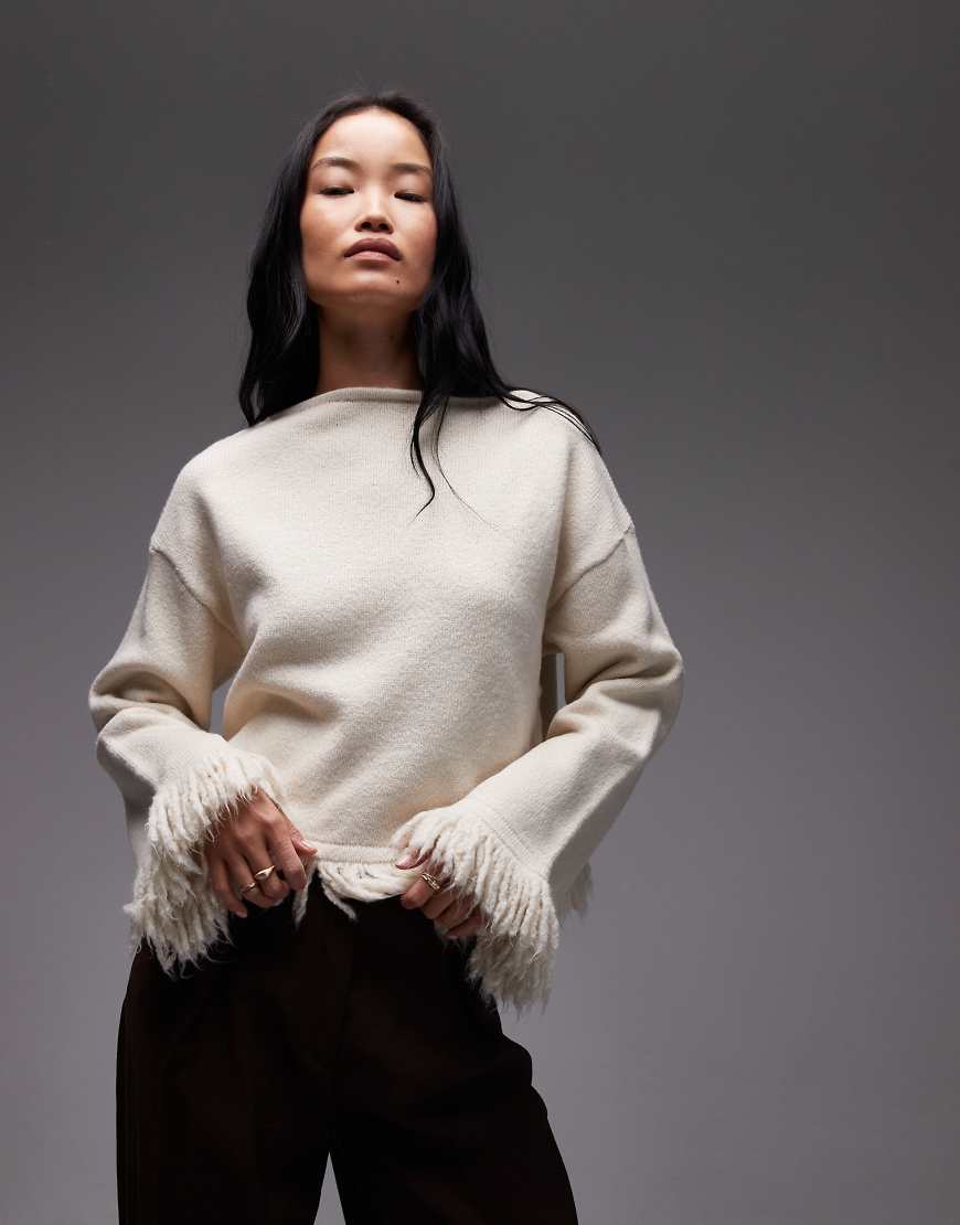 ASOS DESIGN - Oversize-Strickpullover in Ecru mit Quasten-Weiß ASOS DESIGN - Oversize-Strickpullover in Ecru mit Quasten-Weiß von ASOS DESIGN