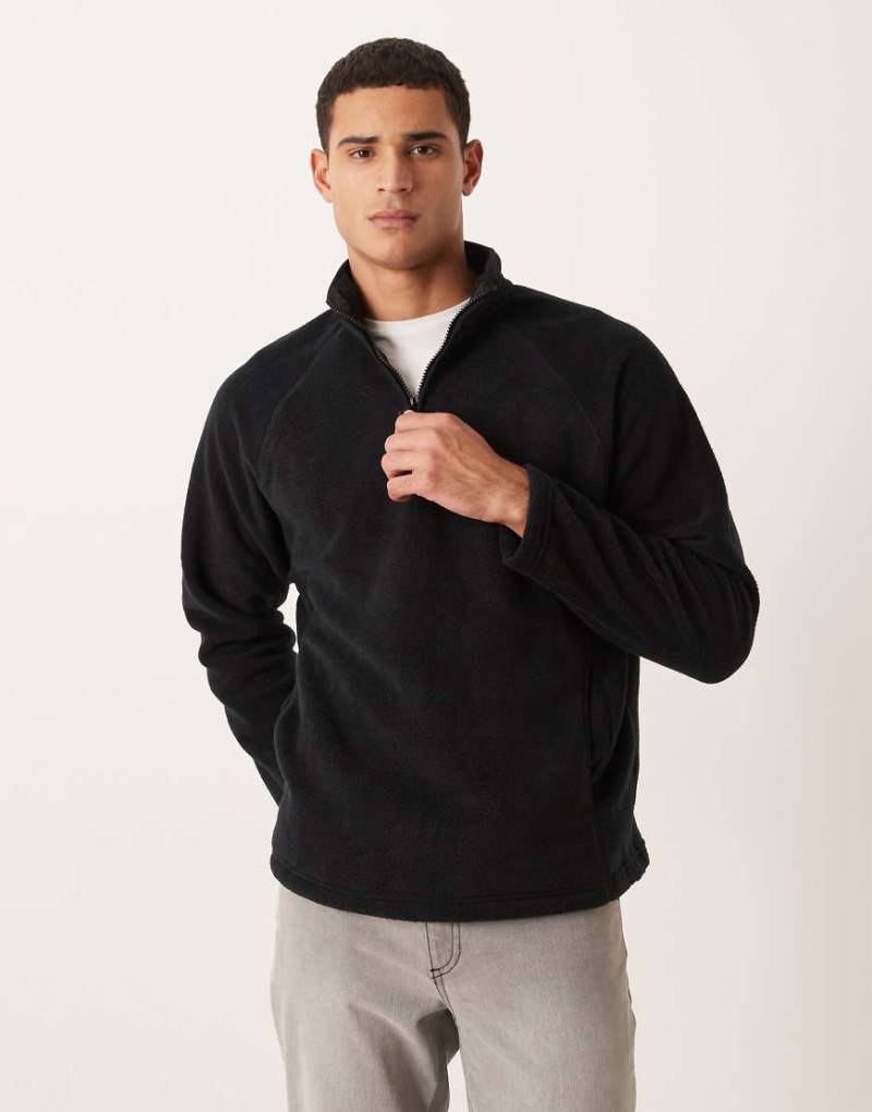 ASOS DESIGN - Locker geschnittenes Fleece-Sweatshirt in Schwarz mit Stehkragen und kurzem Reißverschluss von ASOS DESIGN