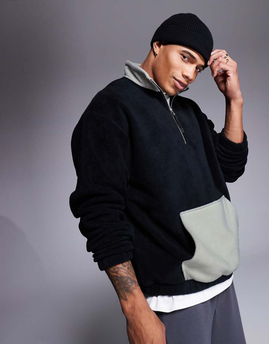 ASOS DESIGN - Oversize-Sweatshirt in Schwarz aus Fleece mit kurzem Reißverschluss und Tasche ASOS DESIGN - Oversize-Sweatshirt in Schwarz aus Fleece mit kurzem Reißverschluss und Tasche von ASOS DESIGN