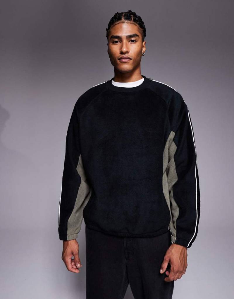 ASOS DESIGN - Locker geschnittenes Fleece-Sweatshirt in Grau mit Paspelierung und Colourblock-Design-Schwarz von ASOS DESIGN