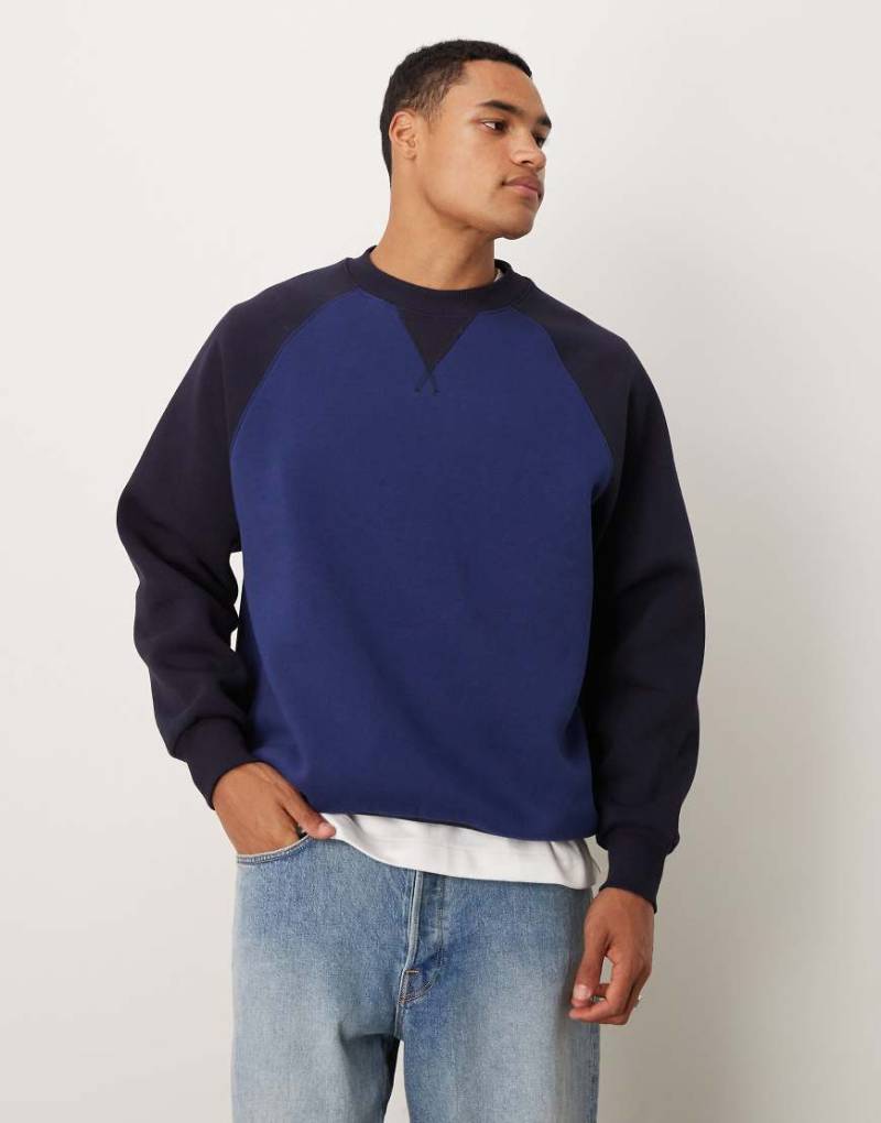 ASOS DESIGN - Locker geschnittenes Sweatshirt in Marineblau mit Raglanärmeln, Kombiteil von ASOS DESIGN
