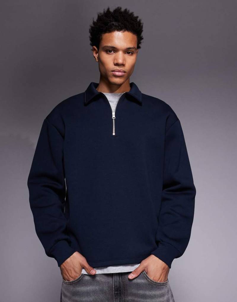 ASOS DESIGN - Oversize-Sweatshirt in Marineblau mit kurzem Reißverschluss, Kragen und festgenähtem Saum von ASOS DESIGN