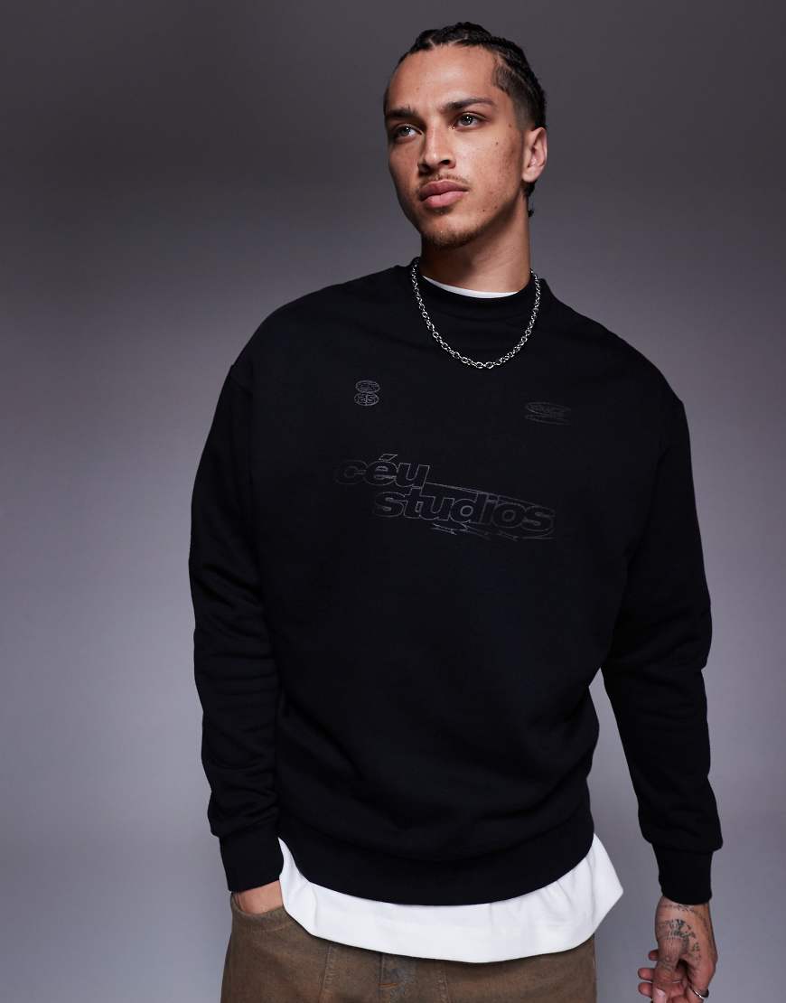 ASOS DESIGN - Oversize-Sweatshirt in Schwarz mit Metallic-Prints ASOS DESIGN - Oversize-Sweatshirt in Schwarz mit Metallic-Prints von ASOS DESIGN