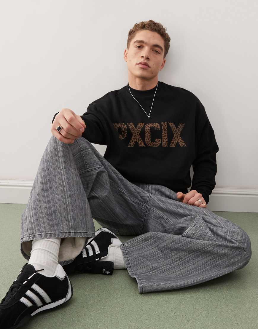 ASOS DESIGN - Sweatshirt in Schwarz mit Schriftzug mit Gepardenmuster ASOS DESIGN - Sweatshirt in Schwarz mit Schriftzug mit Gepardenmuster von ASOS DESIGN